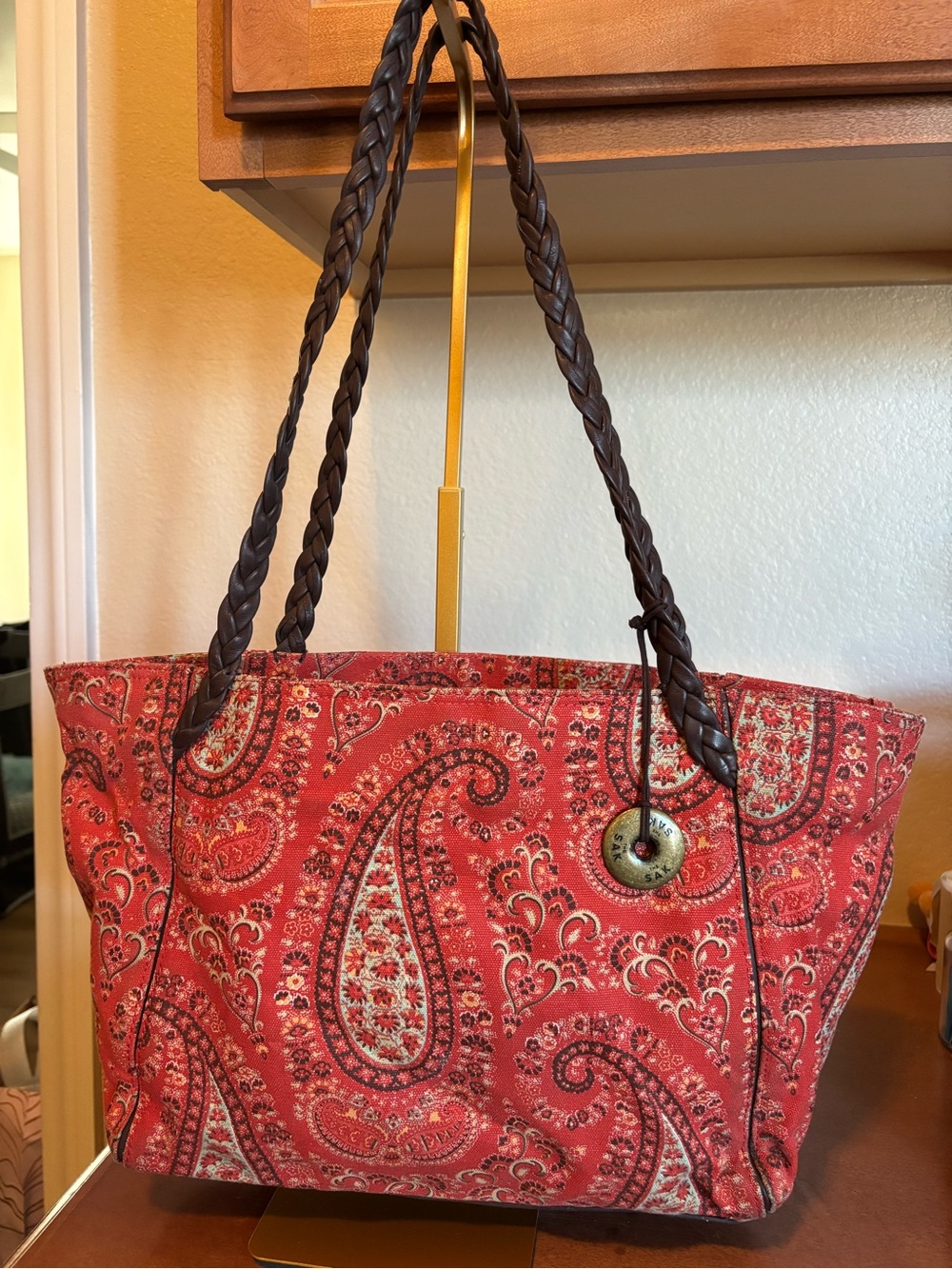 The Sak Red Paisley Tote with Braided Brown Handles